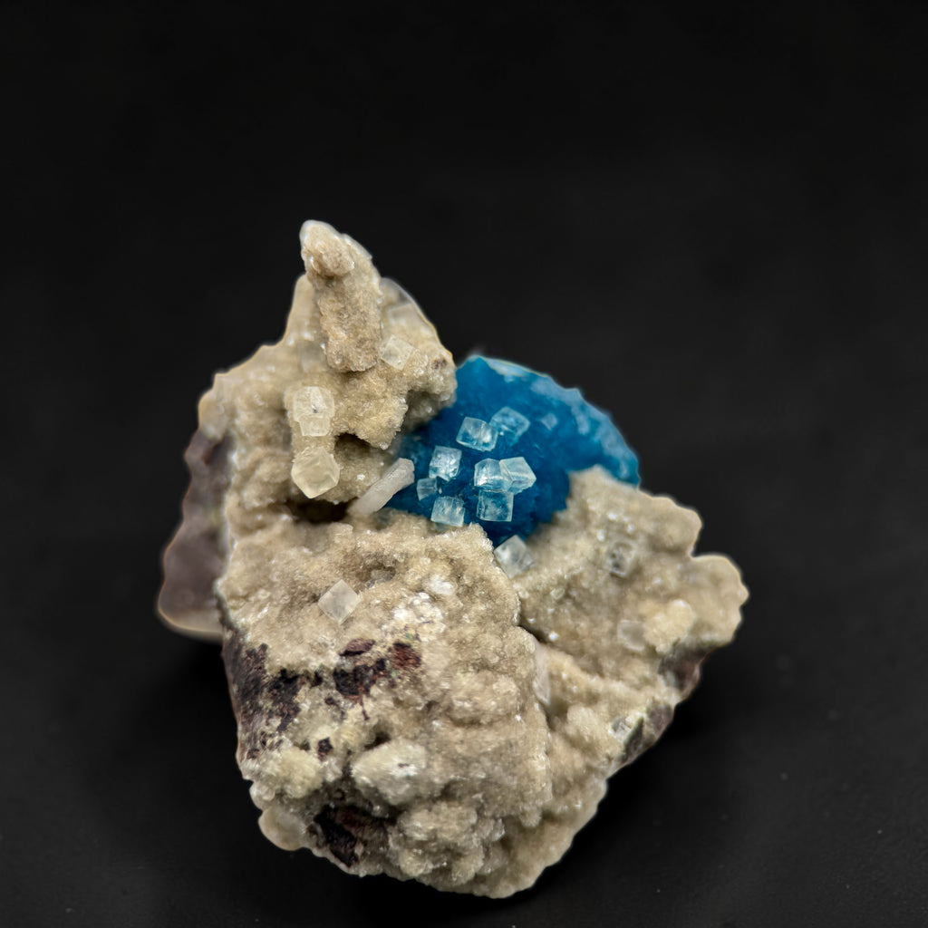 Calcite on Cavansite