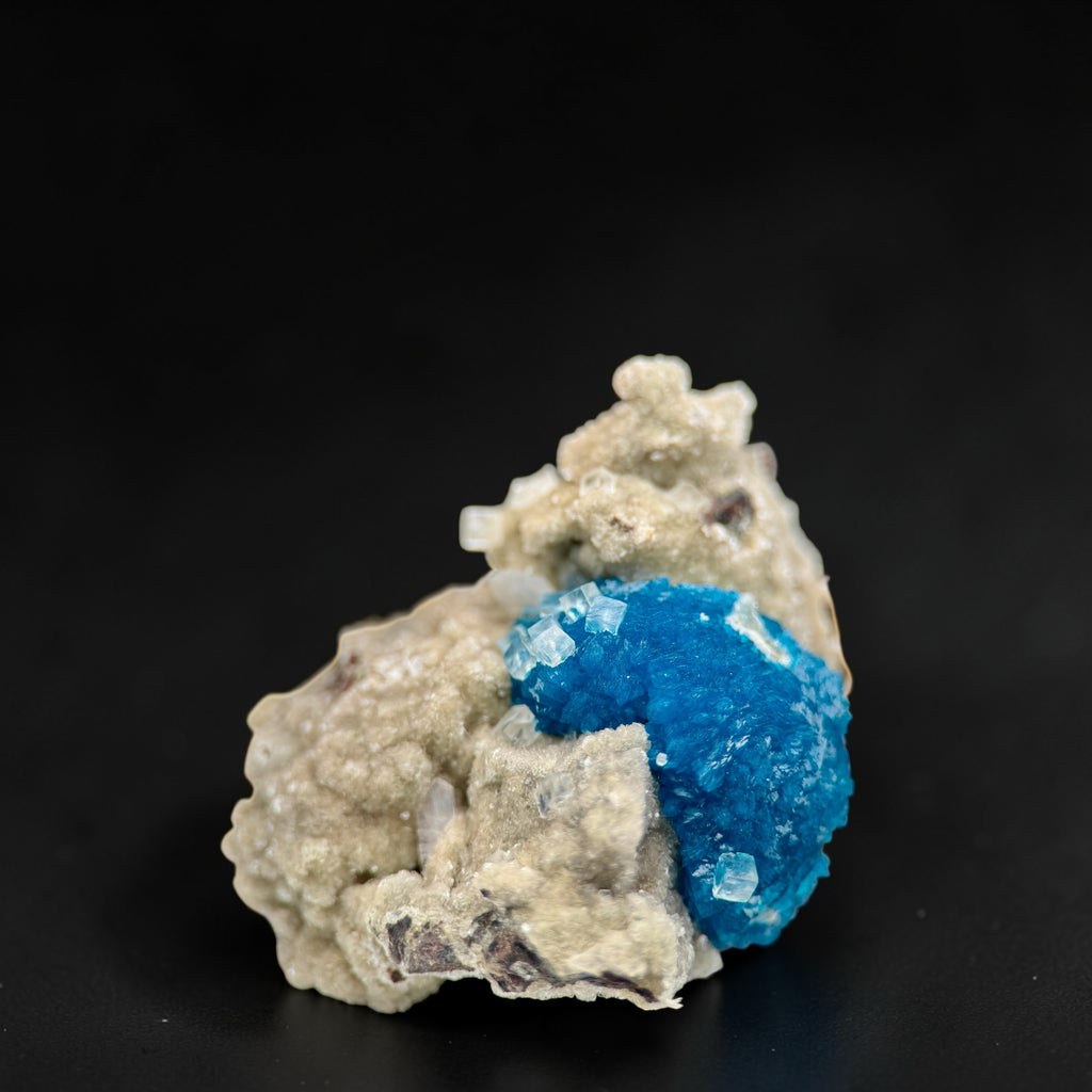 Calcite on Cavansite