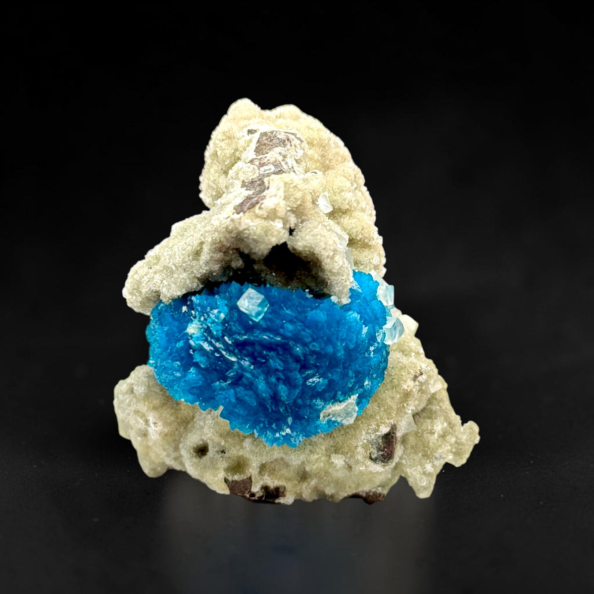Calcite on Cavansite